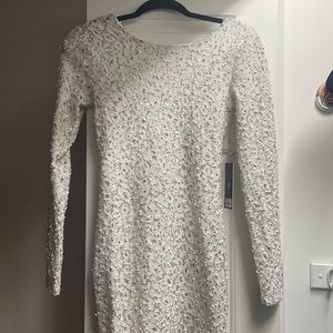 Knee length glittery white dress